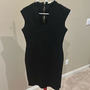 Black cocktail dress with gold back zipper